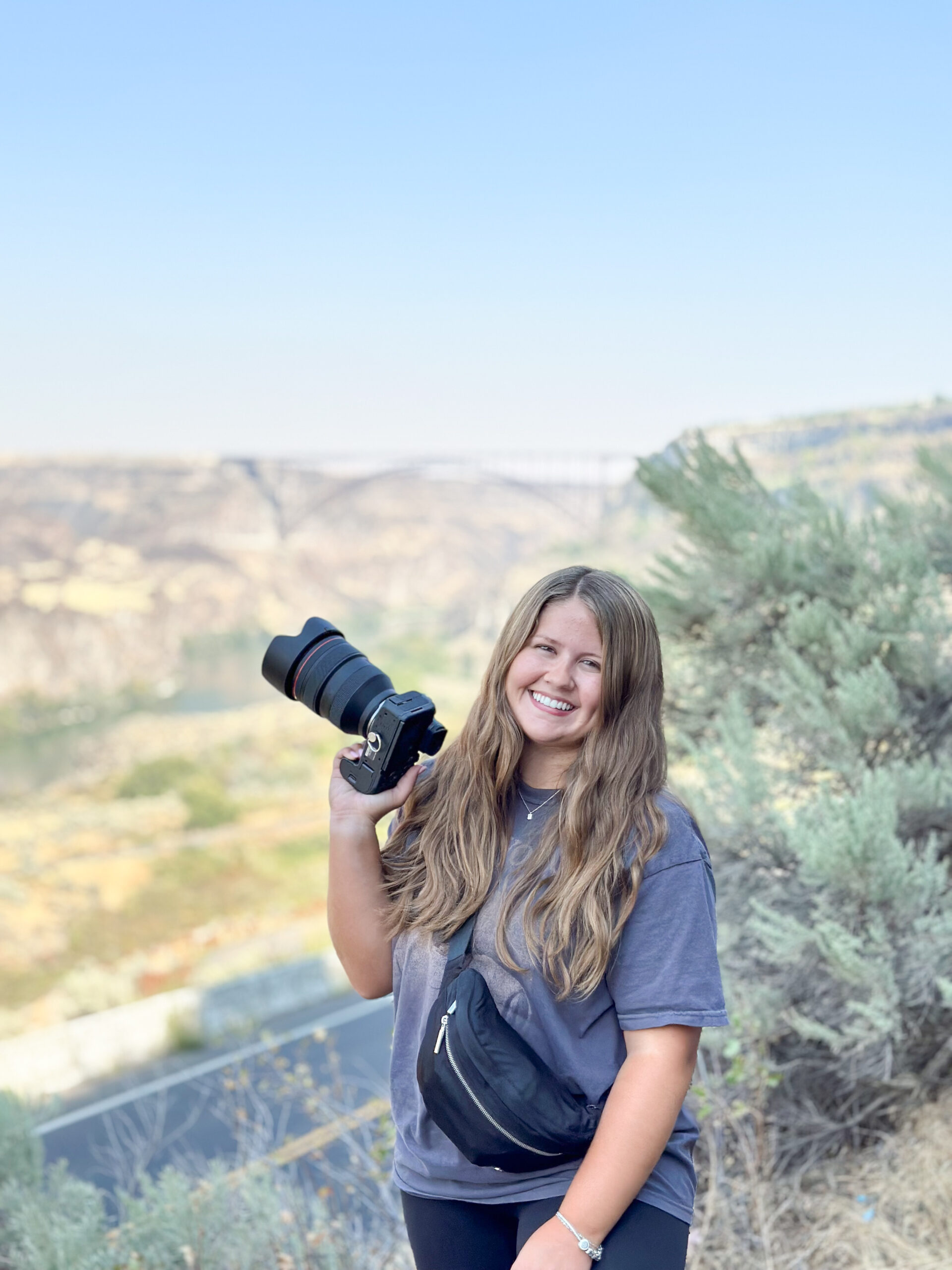 Amanda smiling with camera in Dallas Texas