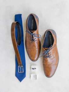 Groom flat lay with groom details